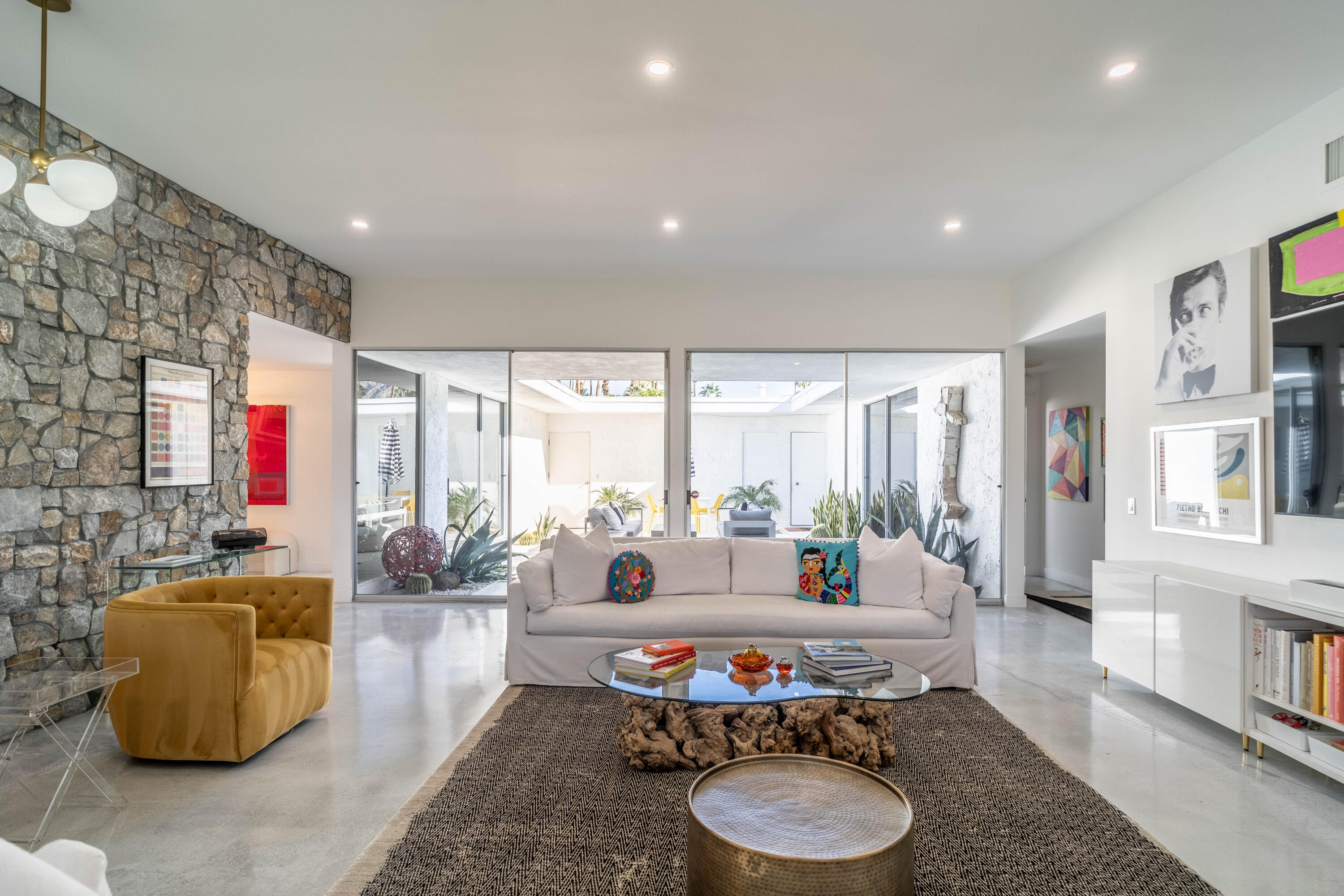 45705 Pawnee Road Indian Wells, CA 92210 - Photo 2 of 59 a living room with furniture and a large window