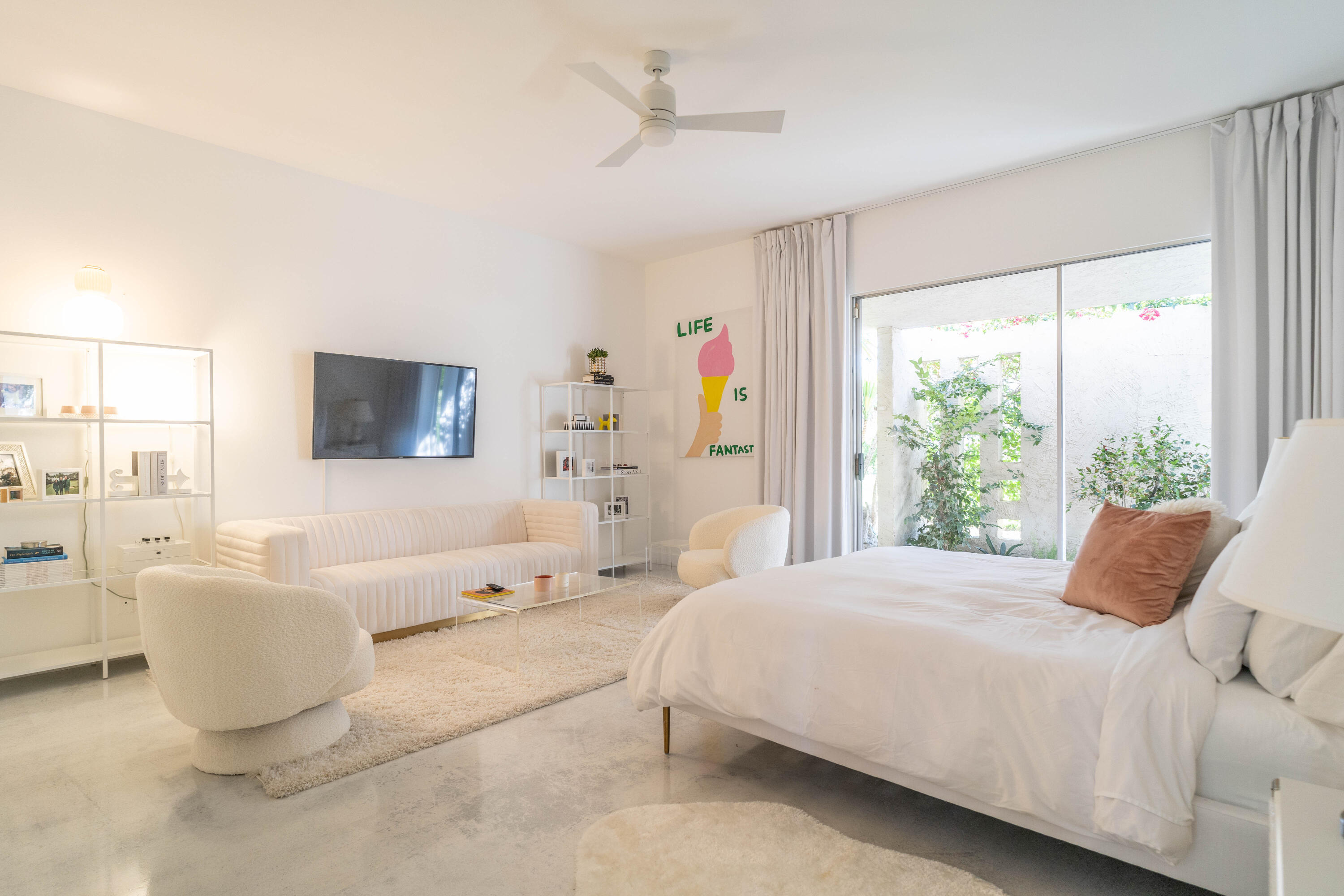 45705 Pawnee Road Indian Wells, CA 92210 - Photo 26 of 59 a bedroom with a large bed and a flat screen tv