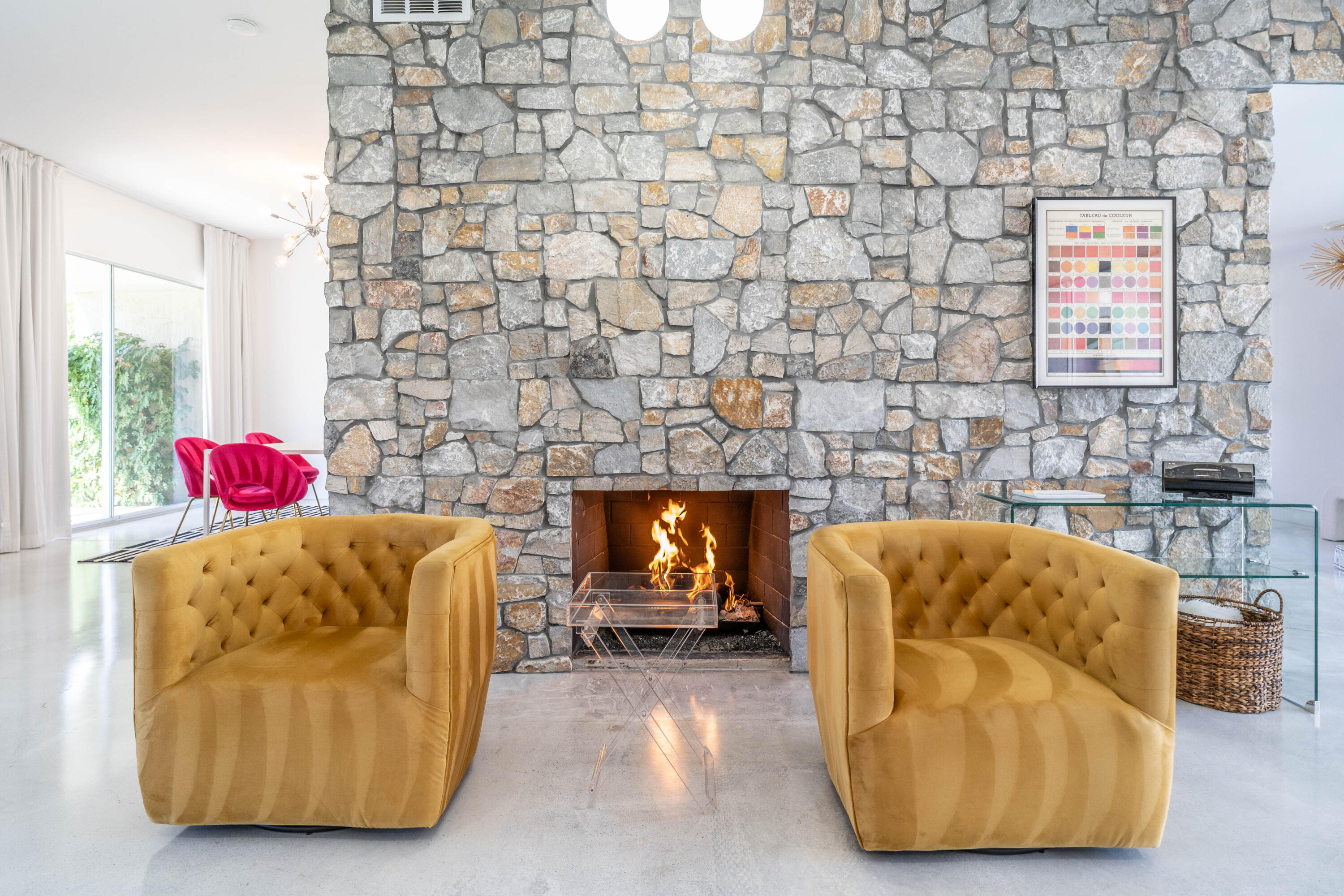 45705 Pawnee Road Indian Wells, CA 92210 - Photo 3 of 59 a living room with a couch and a fireplace