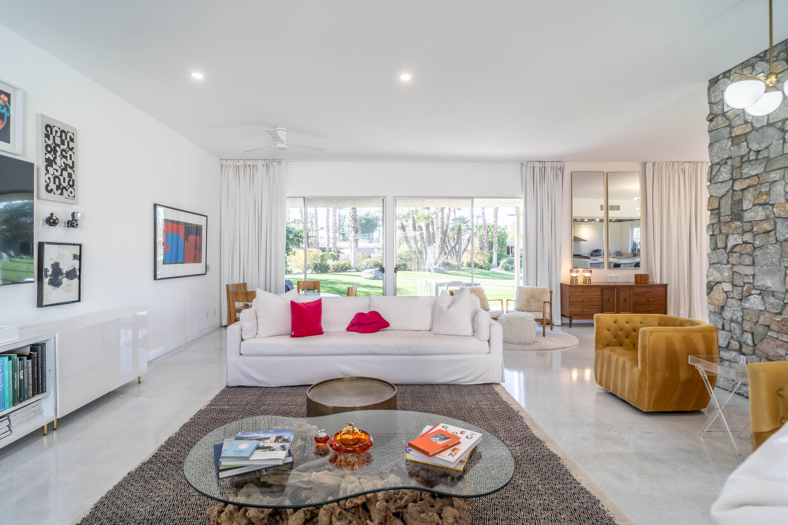 45705 Pawnee Road Indian Wells, CA 92210 - Photo 4 of 59 a living room with furniture and a large window