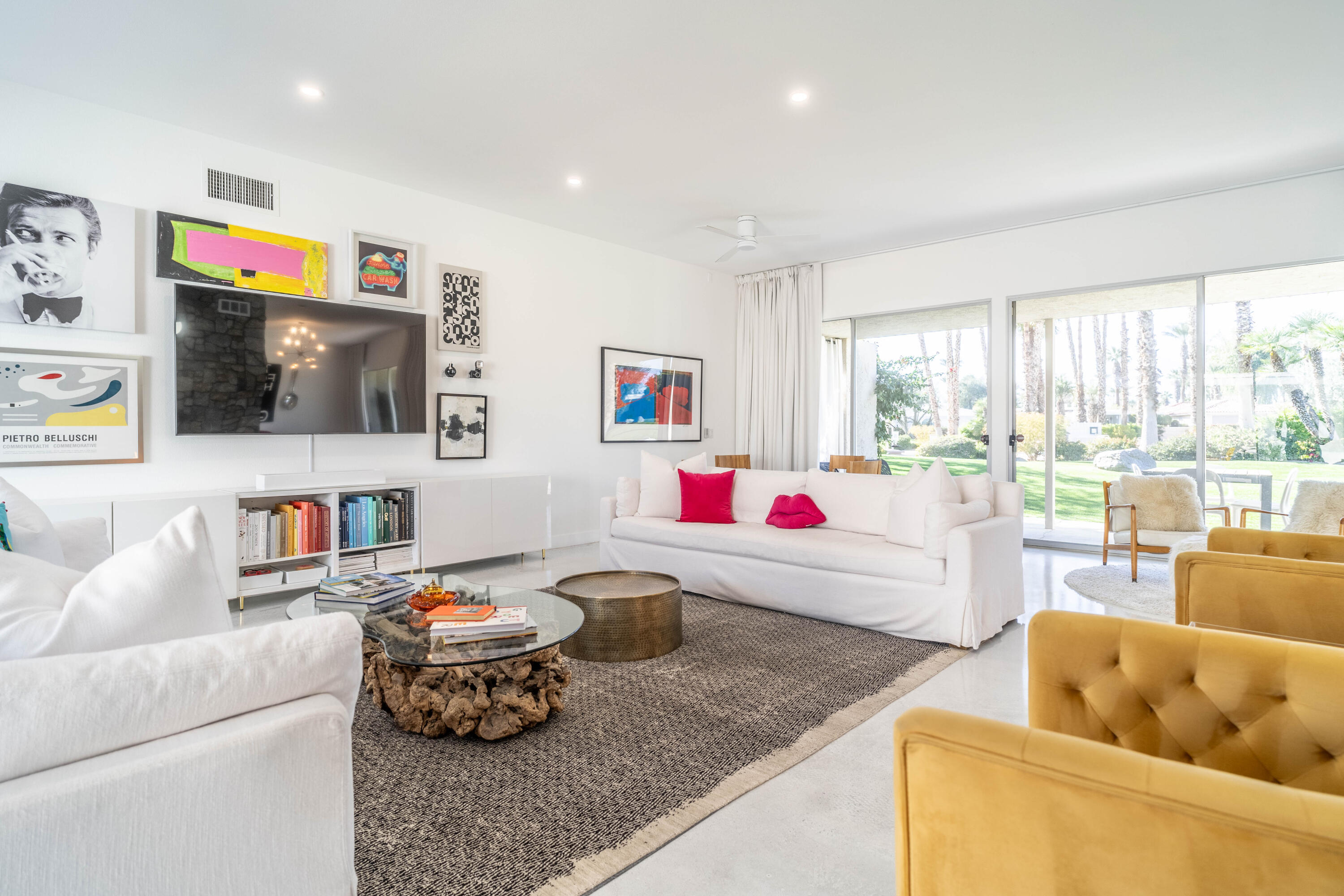 45705 Pawnee Road Indian Wells, CA 92210 - Photo 5 of 59 a living room with furniture and a flat screen tv