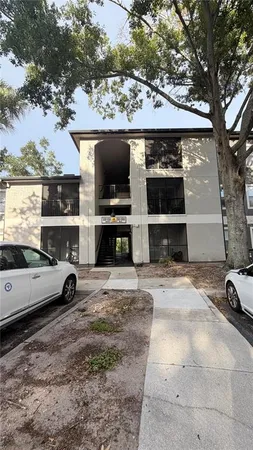 a view of car parked in front of house