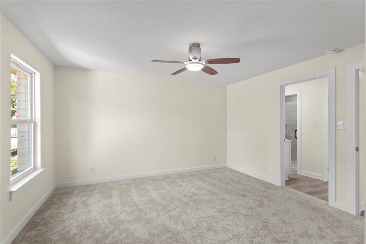 412 Oak Street Bastrop, TX 78602 - Photo 11 of 25 a view of empty room with windows