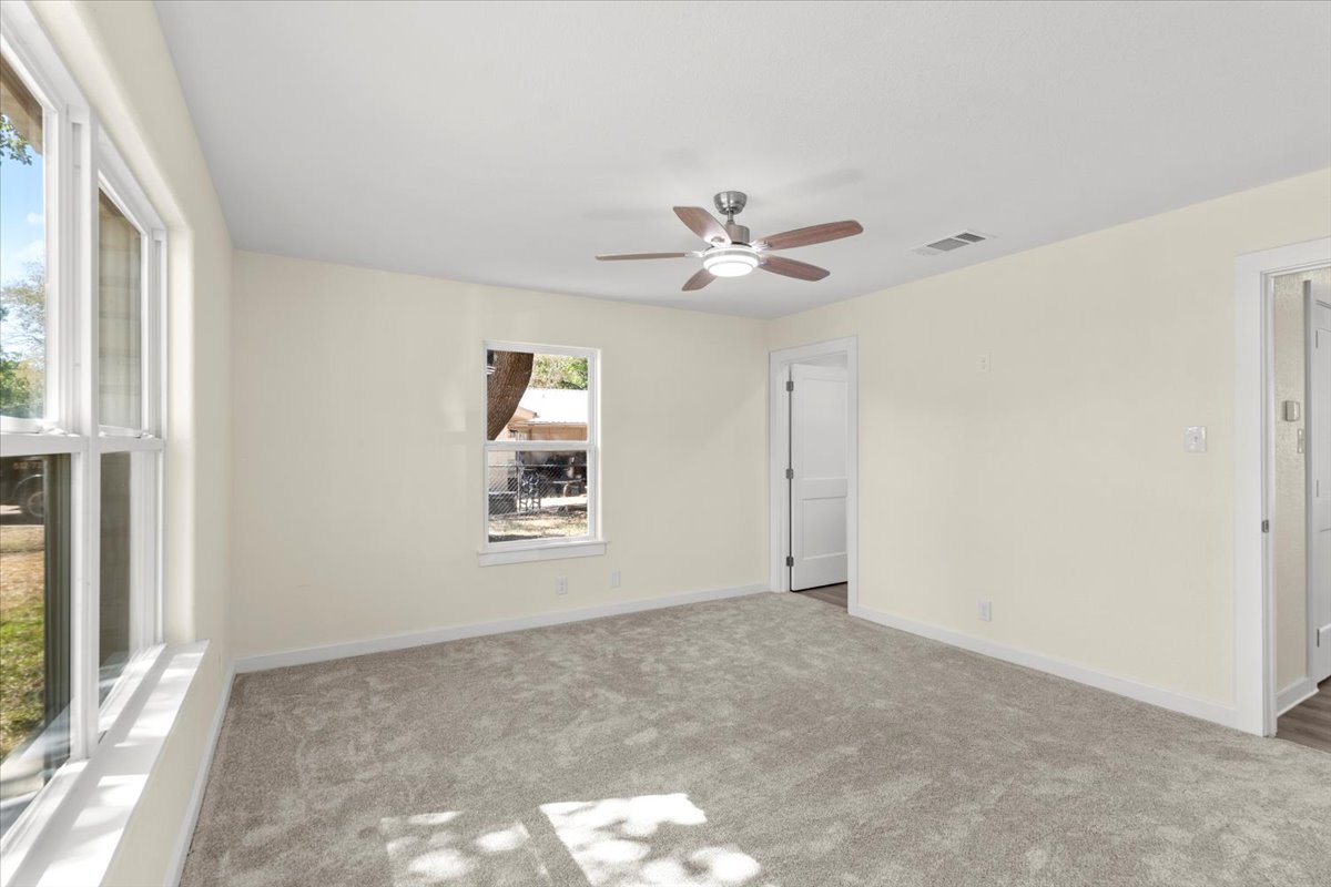 412 Oak Street Bastrop, TX 78602 - Photo 19 of 25 a view of an empty room with a window