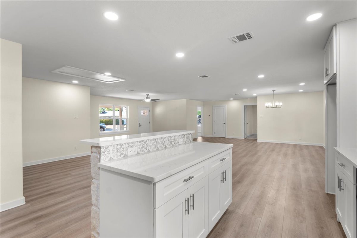 412 Oak Street Bastrop, TX 78602 - Photo 7 of 25 a bathroom with a sink and a mirror