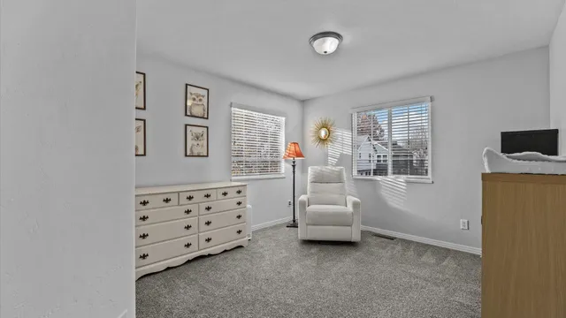 a view of livingroom with furniture and windows