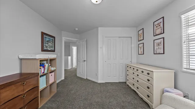 a view of an entryway with wooden floor and windows