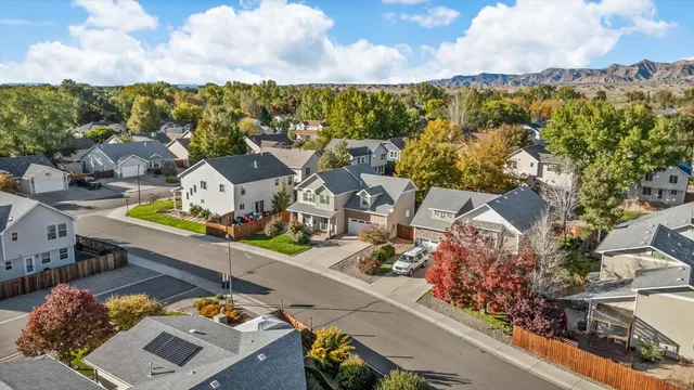 an aerial view of a house with a garden
