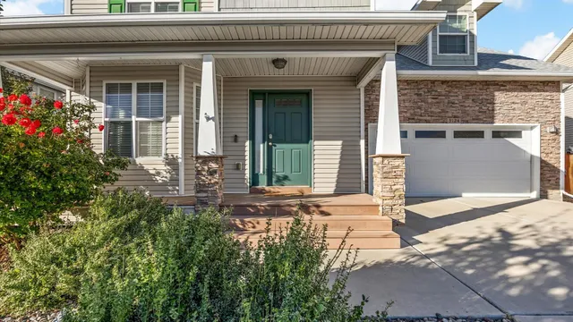 a front view of a house with a porch