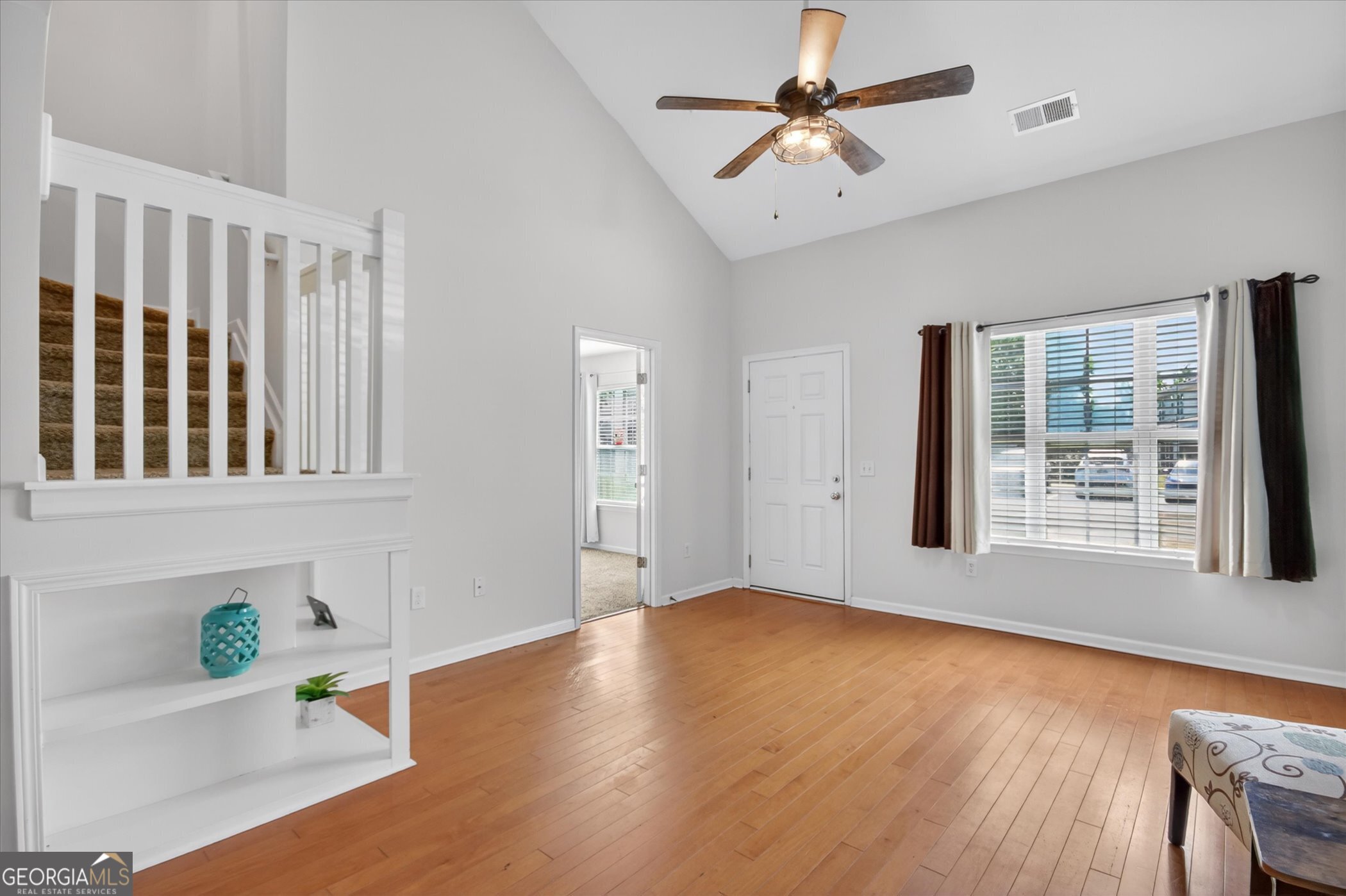 172 Sonata Circle Pooler, GA 31322 - Photo 14 of 85 a view of an empty room with window and wooden floor