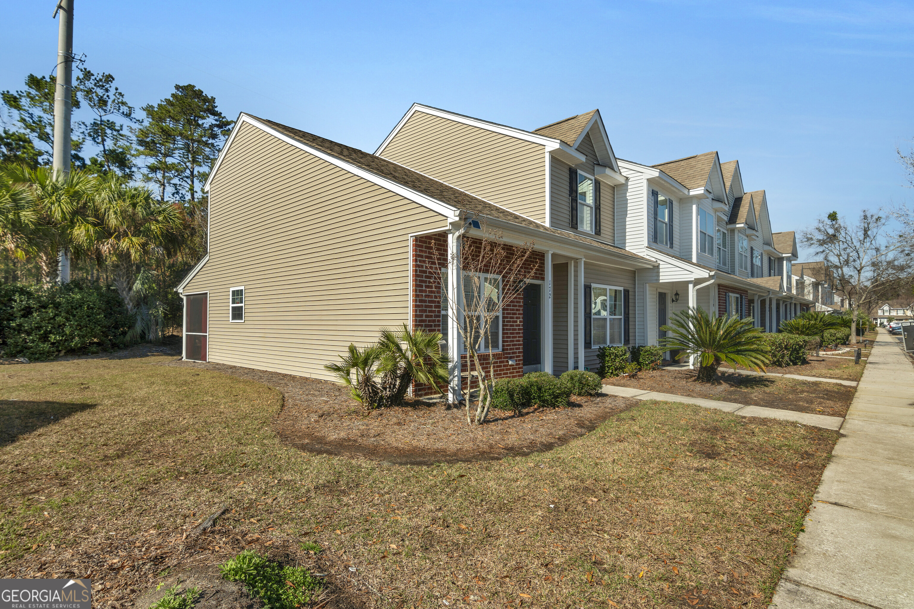 172 Sonata Circle Pooler, GA 31322 - Photo 3 of 85 a view of a house with a yard and potted plants