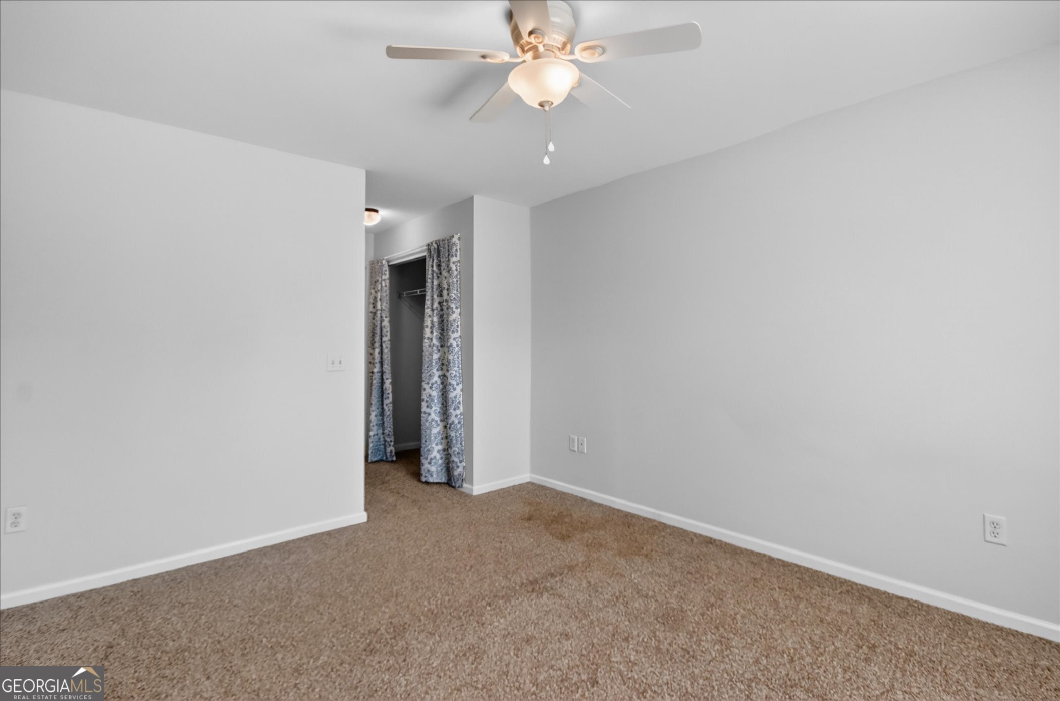 172 Sonata Circle Pooler, GA 31322 - Photo 38 of 85 an empty room with closet and a chandelier fan
