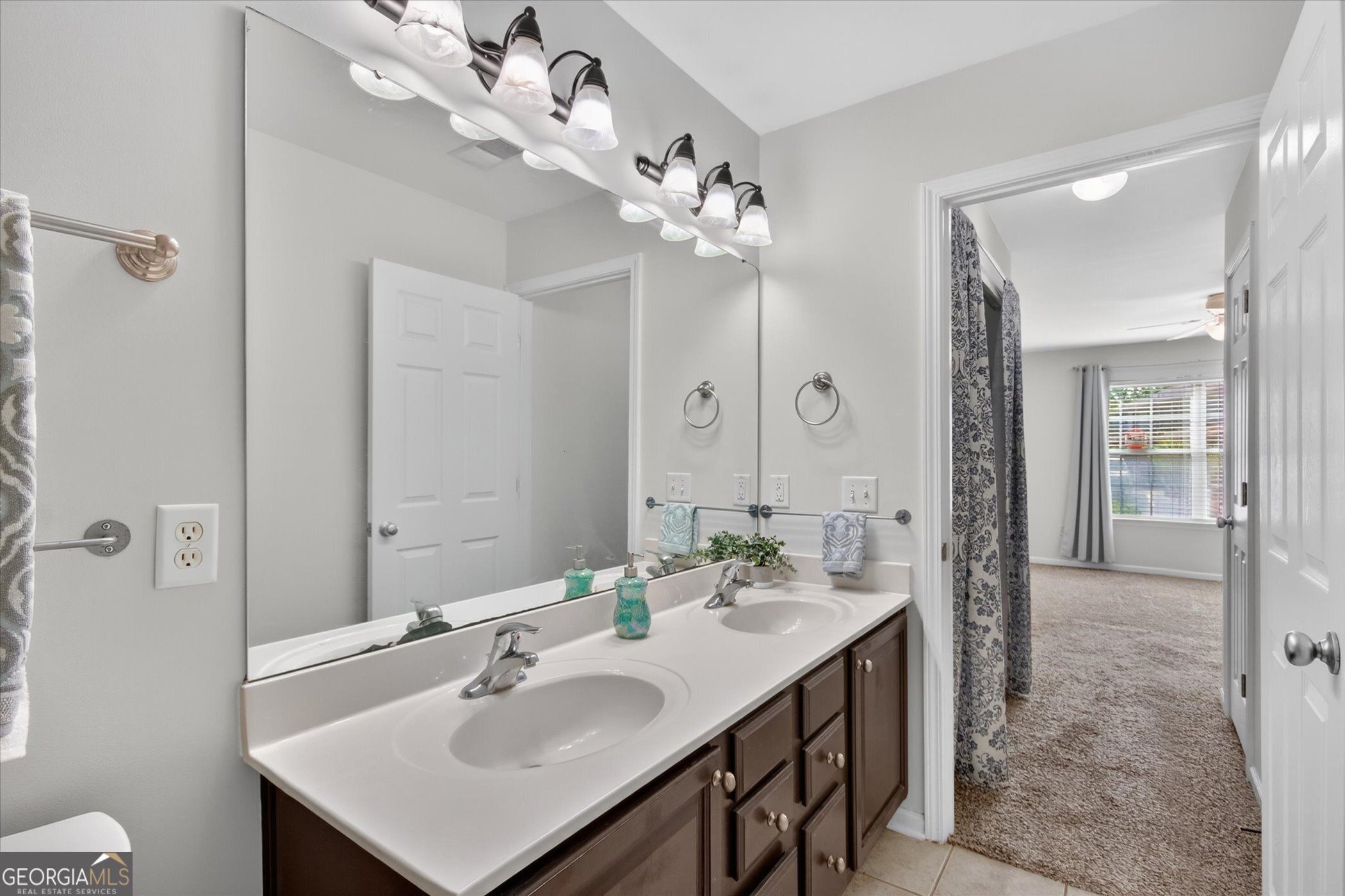 172 Sonata Circle Pooler, GA 31322 - Photo 46 of 85 a bathroom with a sink double vanity and a mirror