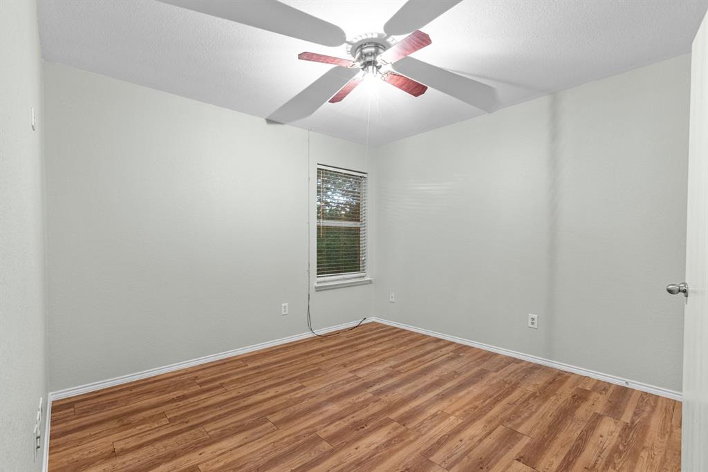 3521 Apple Valley Way Dallas, TX 75227 - Photo 16 of 25 wooden floor in an empty room