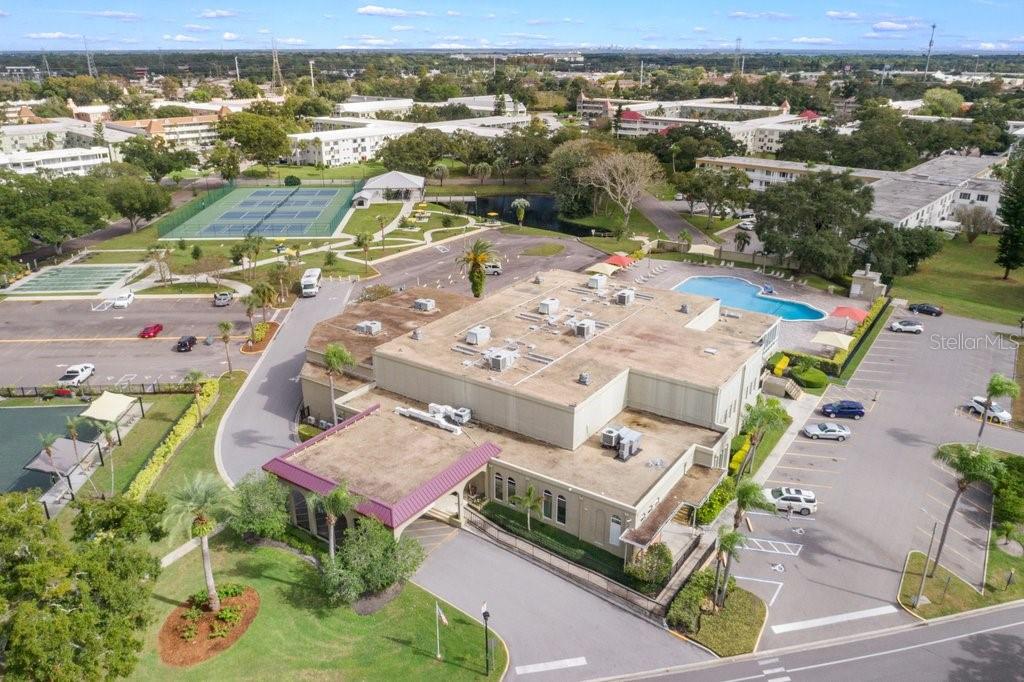 2461 Canadian Way, Unit 27 Clearwater, FL 33763 - Photo 16 of 35 an aerial view of a houses with a swimming pool