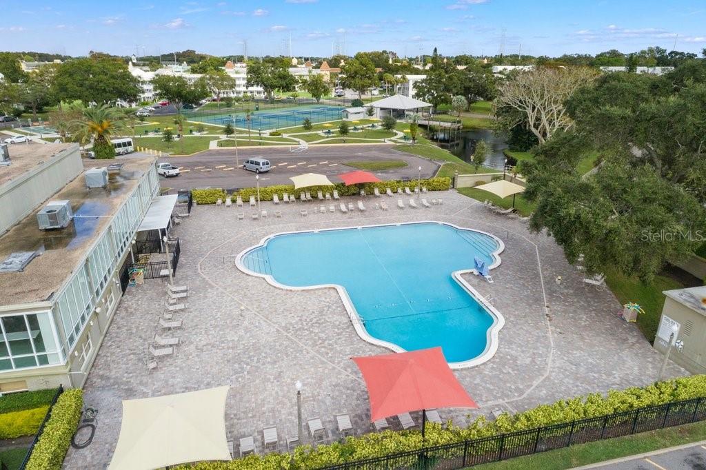 2461 Canadian Way, Unit 27 Clearwater, FL 33763 - Photo 17 of 35 an aerial view of a house with a yard basket ball court and outdoor seating