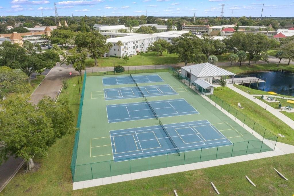 2461 Canadian Way, Unit 27 Clearwater, FL 33763 - Photo 20 of 35 a view of a tennis court