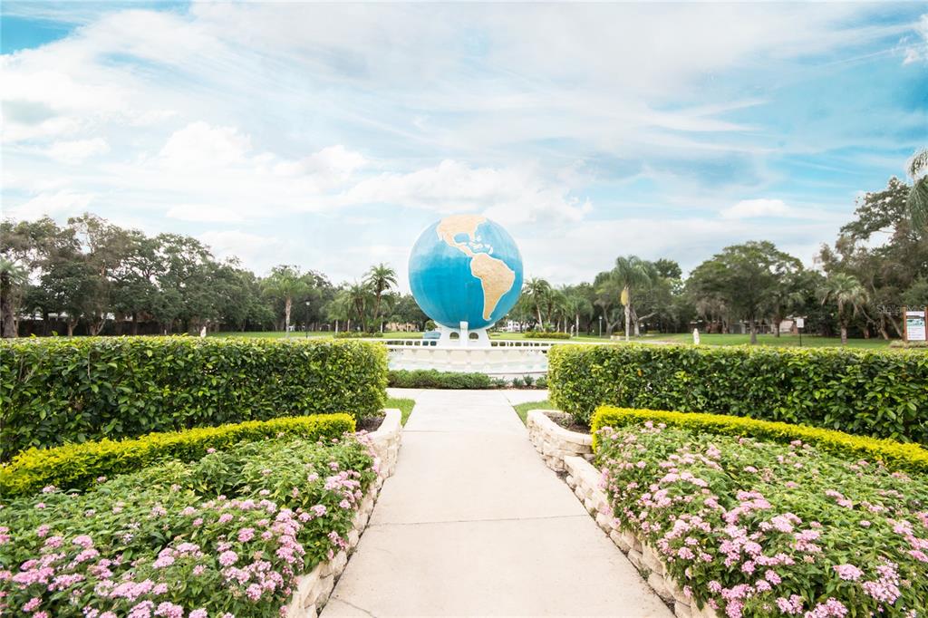 2461 Canadian Way, Unit 27 Clearwater, FL 33763 - Photo 22 of 35 a view of a garden with houses