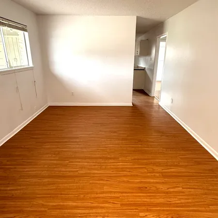 a view of an ocean from a hallway