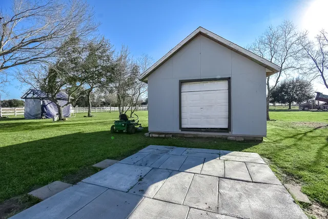 a view of backyard with outdoor space