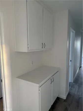a utility room with cabinets