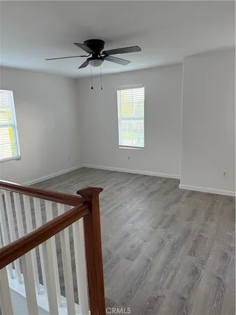 a view of a hallway with a window