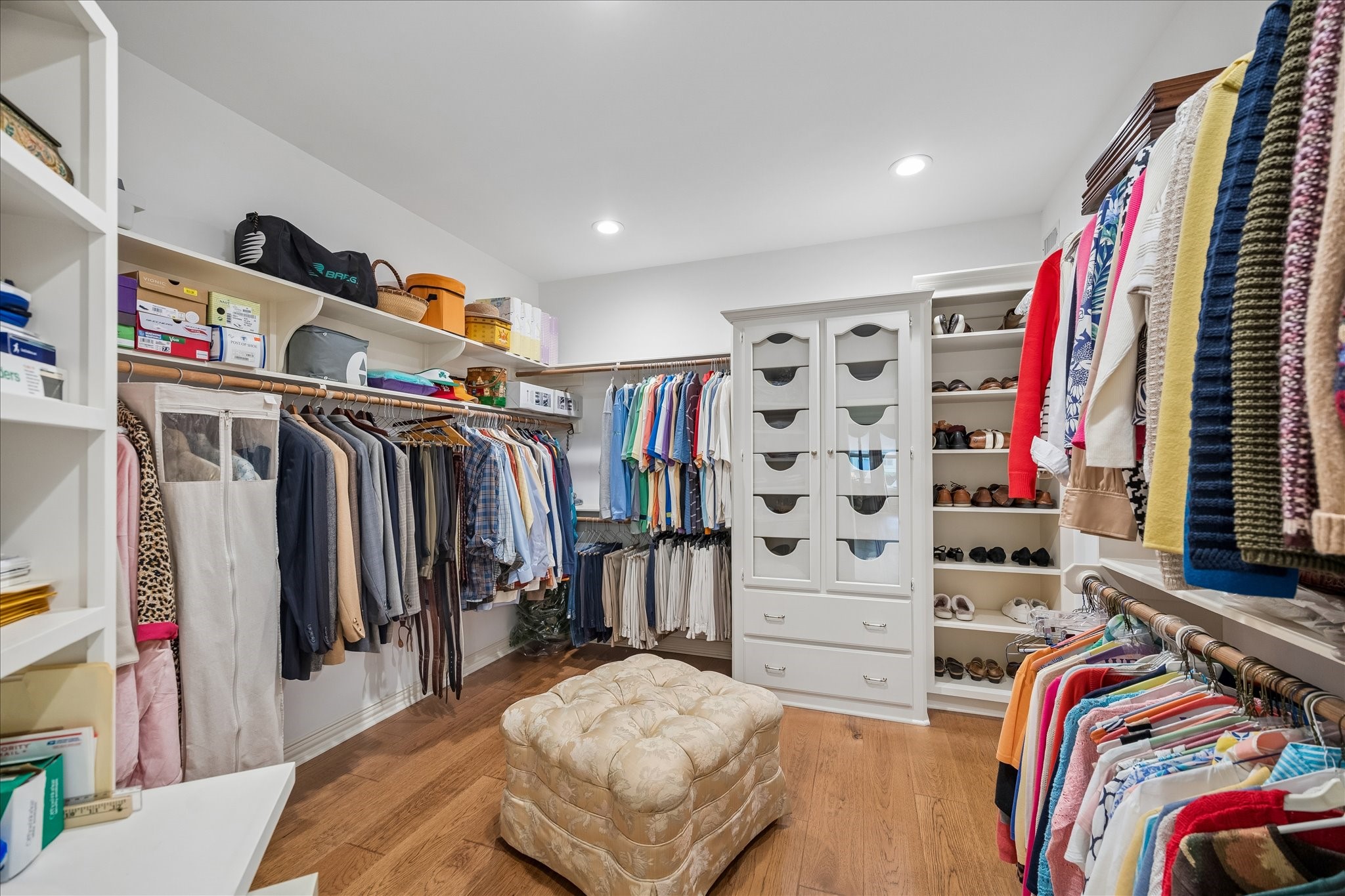 6611 Trebeck Lane Spring, TX 77379 - Photo 21 of 33 xpansive walk-in closet with custom built-ins, abundant hanging space, and organized storage for a boutique-style dressing experience.