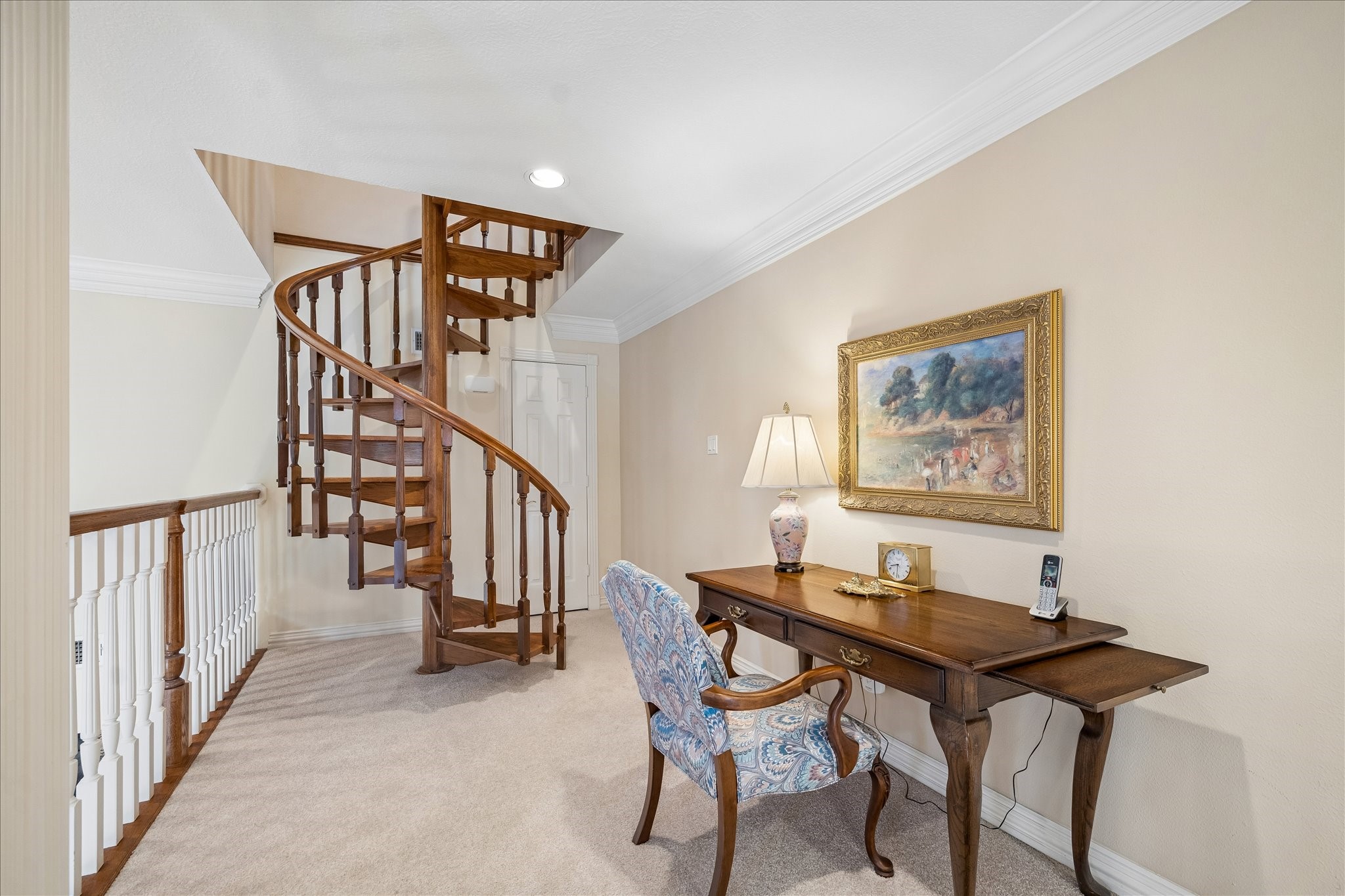 6611 Trebeck Lane Spring, TX 77379 - Photo 22 of 33 Charming upper landing with custom spiral staircase offers flexible space for reading, work, or play.