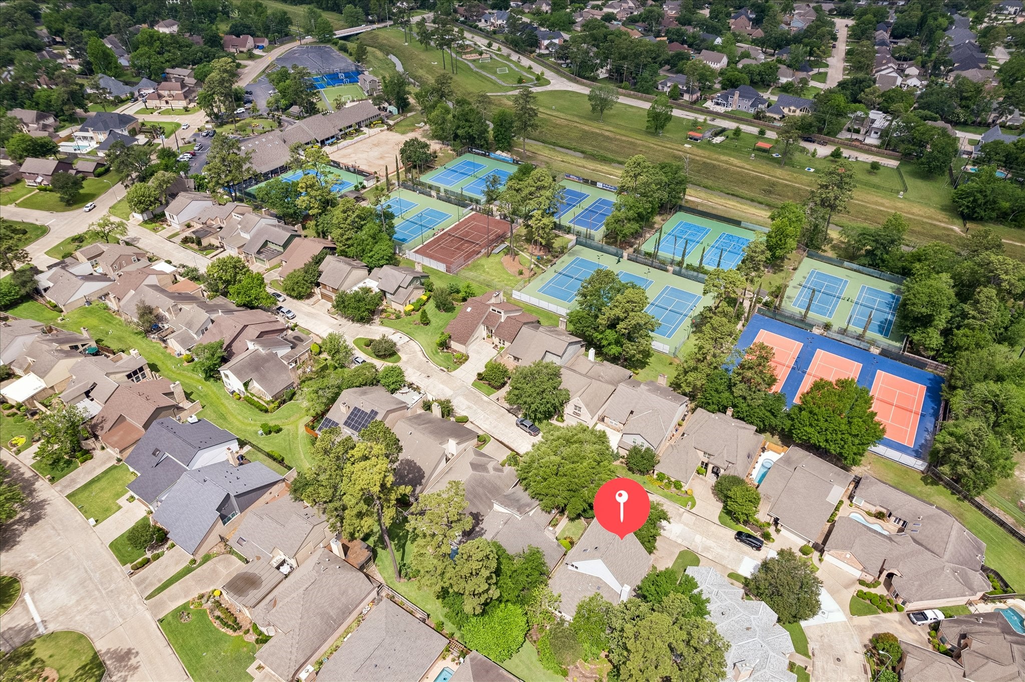 6611 Trebeck Lane Spring, TX 77379 - Photo 33 of 33 Ideally located near neighborhood amenities including Giammalva Racquet & Tennis Club, parks, and green space, offering an active lifestyle just moments from your doorstep.