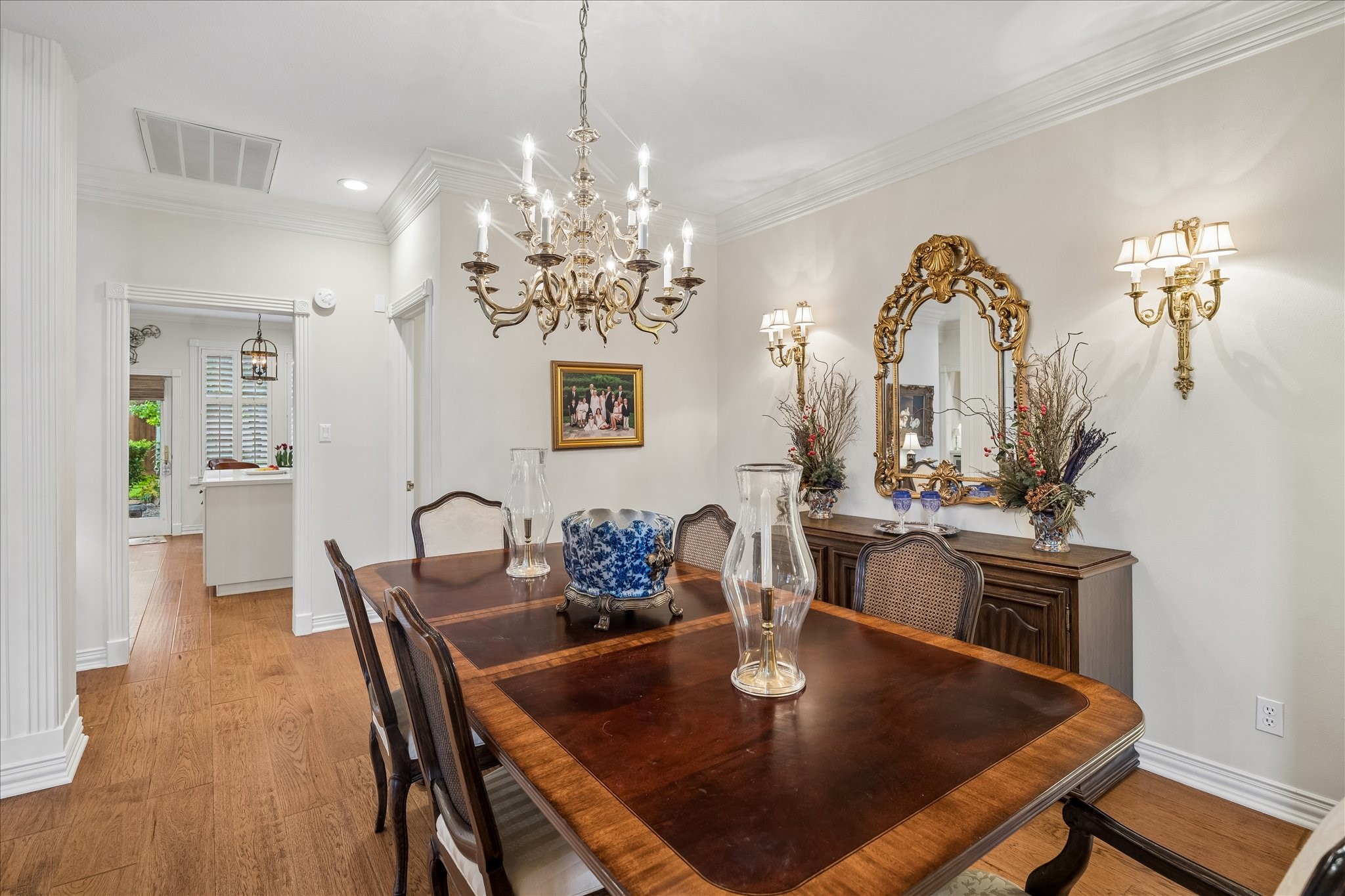 6611 Trebeck Lane Spring, TX 77379 - Photo 9 of 33 Spacious dining area with seamless flow to the wet bar & kitchen, offering both functionality and timeless style for everyday meals or entertaining.