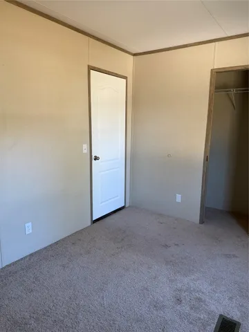 an empty room with a door