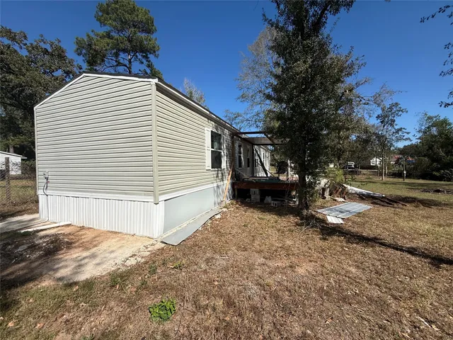 a view of backyard of house