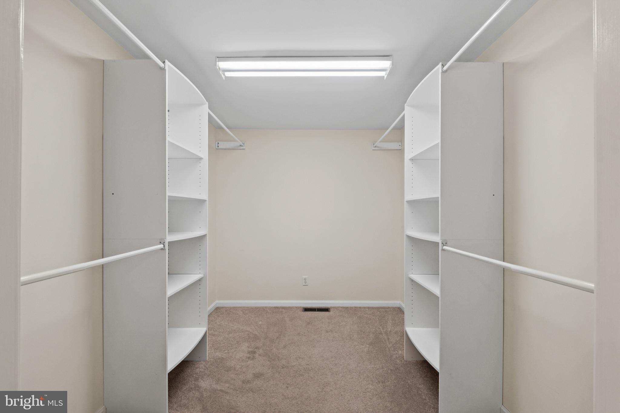 23116 Gilpin Point Road Preston, MD 21655 - Photo 23 of 66 Owner’s suite walk-in closet.