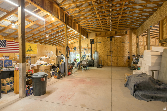 684 Blue Mountain Ridge Monticello, UT 84535 - Photo 20 of 71 Misc room featuring concrete floors and vaulted ceiling