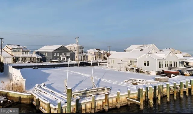 a large building with a clock tower in front of it