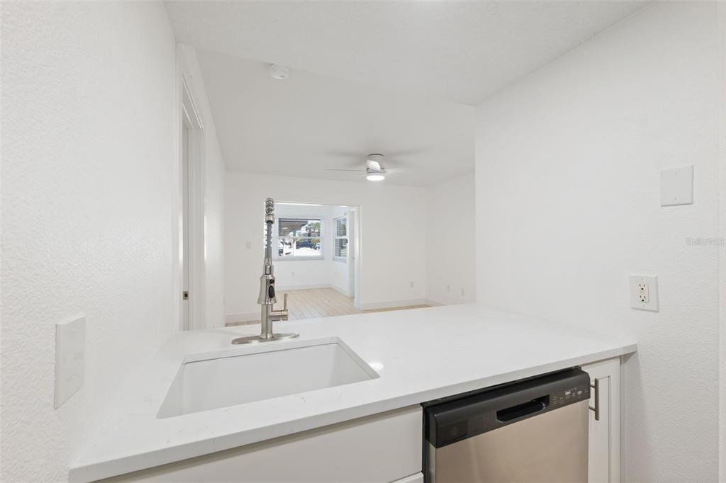 4812 Jasper Drive, Unit 105 New Port Richey, FL 34652 - Photo 18 of 63 a bathroom with a sink and a mirror