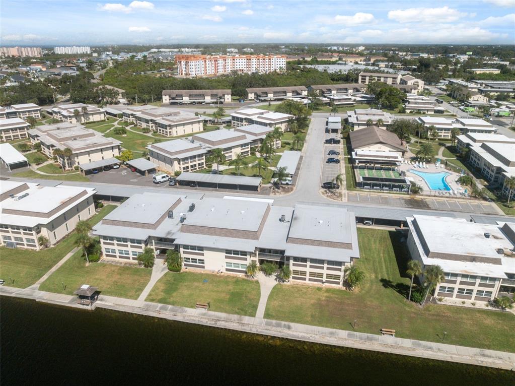 4812 Jasper Drive, Unit 105 New Port Richey, FL 34652 - Photo 38 of 63 an aerial view of residential houses with outdoor space