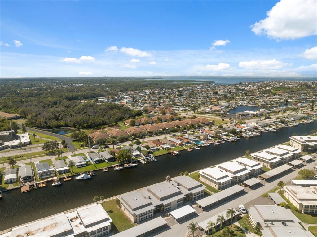 4812 Jasper Drive, Unit 105 New Port Richey, FL 34652 - Photo 49 of 63 an aerial view of residential building with ocean view