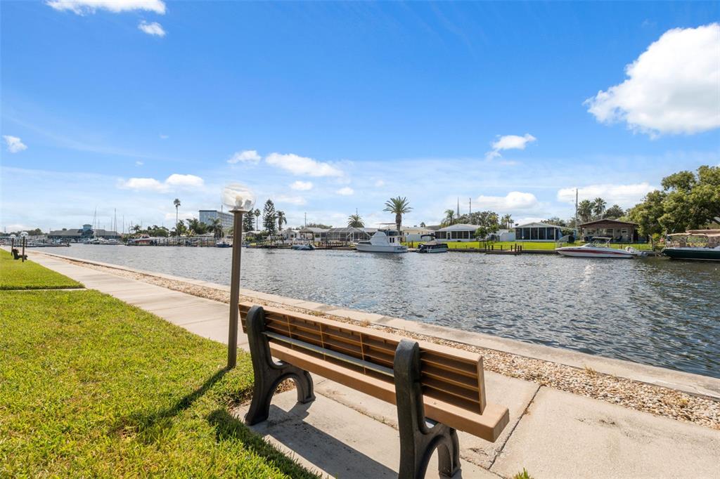4812 Jasper Drive, Unit 105 New Port Richey, FL 34652 - Photo 5 of 63 a view of a lake with outdoor space