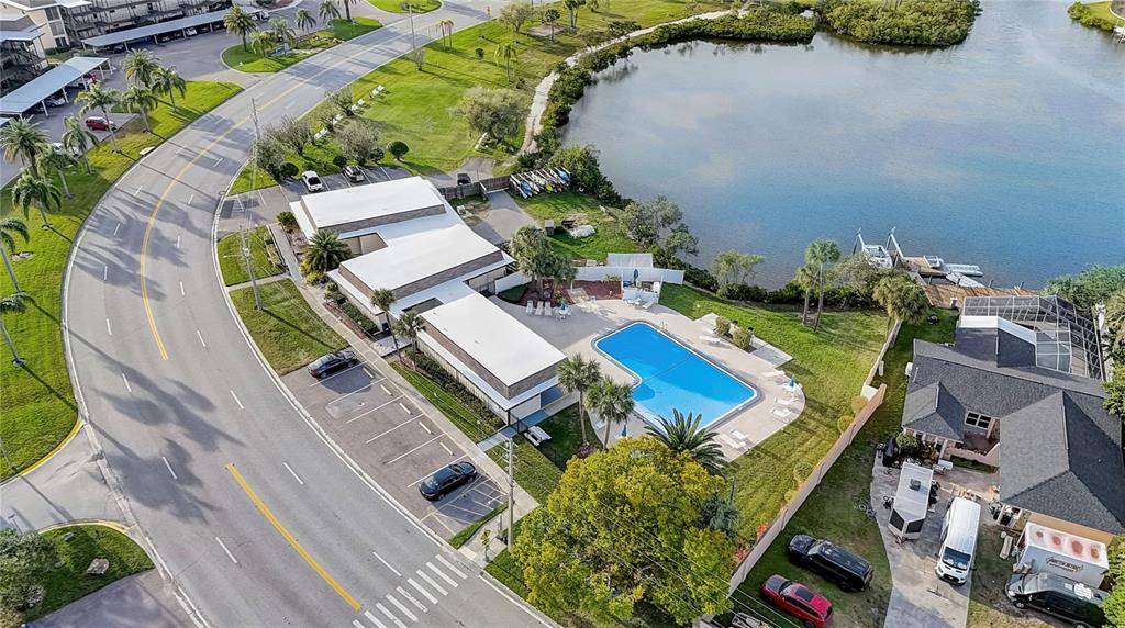 4812 Jasper Drive, Unit 105 New Port Richey, FL 34652 - Photo 59 of 63 an aerial view of a house with a yard basket ball court and outdoor seating
