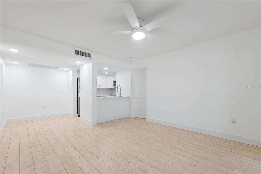 4812 Jasper Drive, Unit 105 New Port Richey, FL 34652 - Photo 9 of 63 a view of a kitchen with a sink and a refrigerator