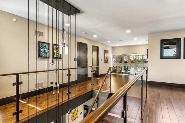 a bathroom with a shower and a sink