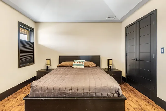 a room with gym equipment and a flat screen tv