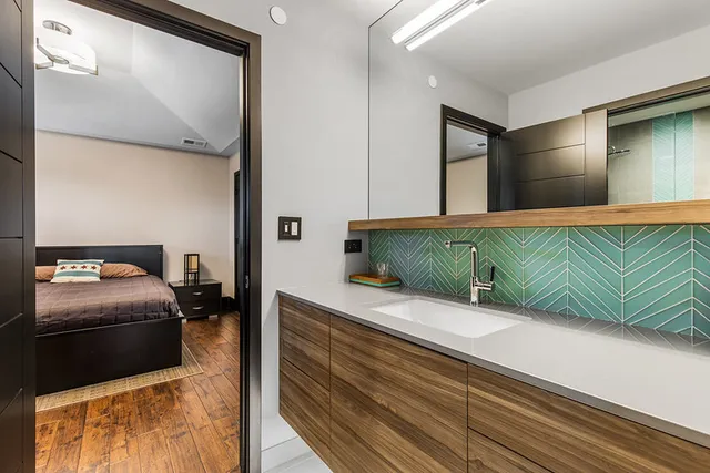 a view of a house with a backyard porch and sitting area