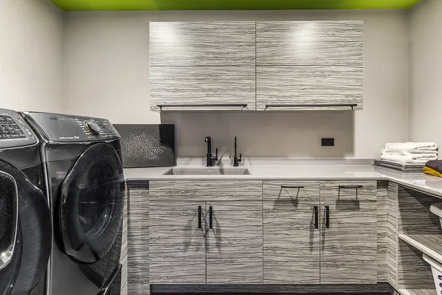 a front view of a house with a yard table and chairs