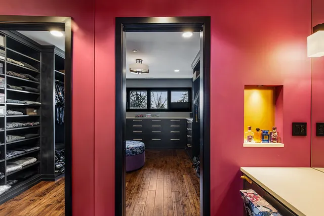 a front view of a house with a garden and porch