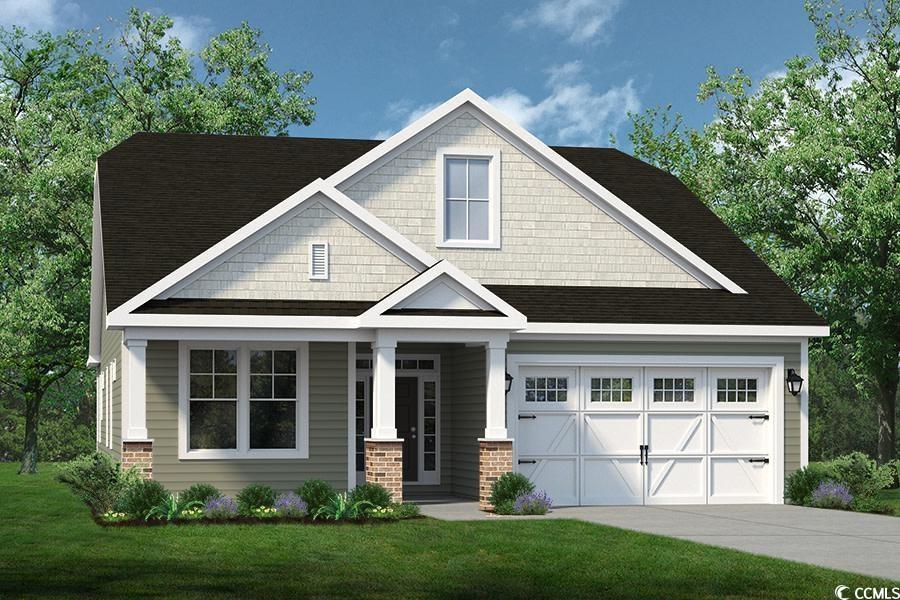 Craftsman-style home with a porch, a front lawn, a garage, and concrete driveway