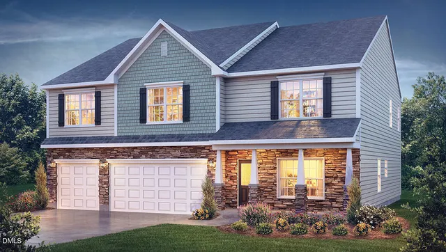 front view of a house and a yard