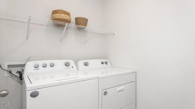 a bathroom with a sink vanity granite and toilet