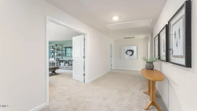 a bathroom with a sink mirror and toilet